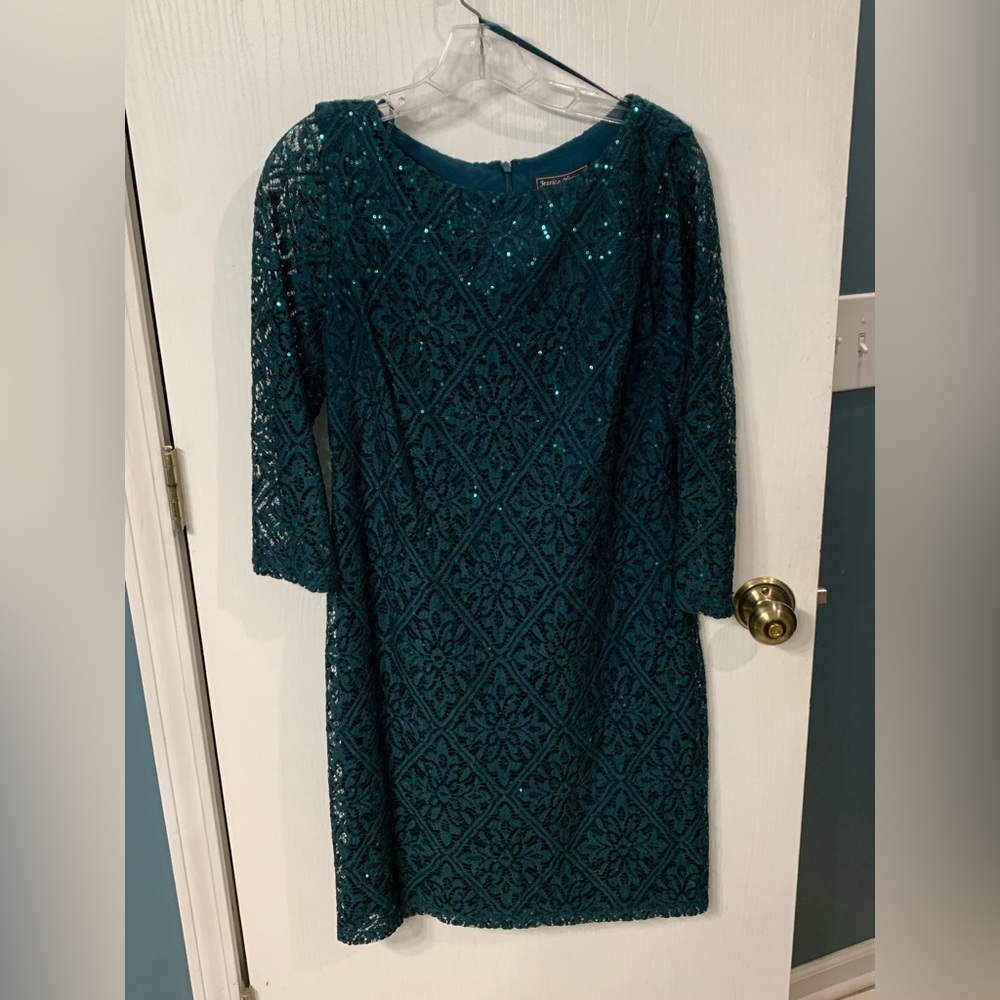 Knee length cocktail dress with lace overlay